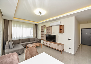 Трехкомнатная квартира в районе Махмутлар с видом на горы