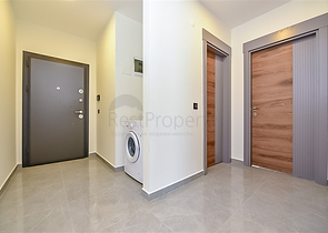 Трехкомнатная квартира в районе Махмутлар с видом на горы