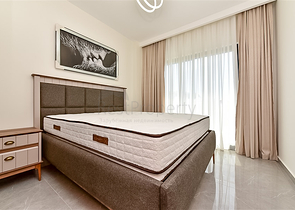 Трехкомнатная квартира в районе Махмутлар с видом на горы