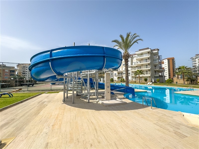 Квартира с просторной планировкой 1+1 в районе Джикджили. 