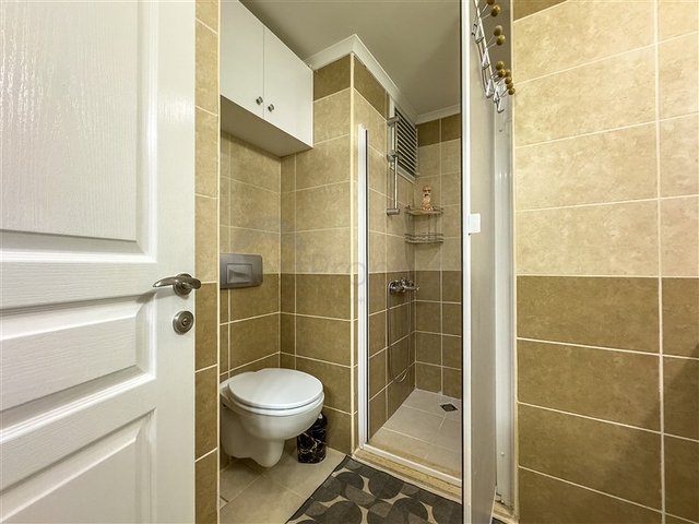 Квартира с просторной планировкой 1+1 в районе Джикджили. 