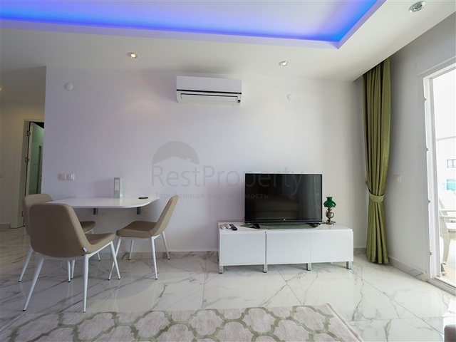 Уютная 1+1 с собственной терассой в районе Оба