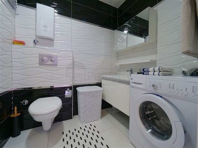 Уютная 1+1 с собственной терассой в районе Оба