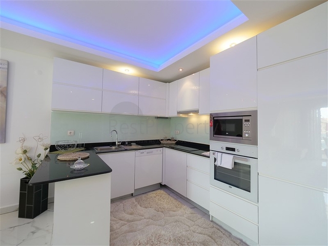 Уютная 1+1 с собственной терассой в районе Оба