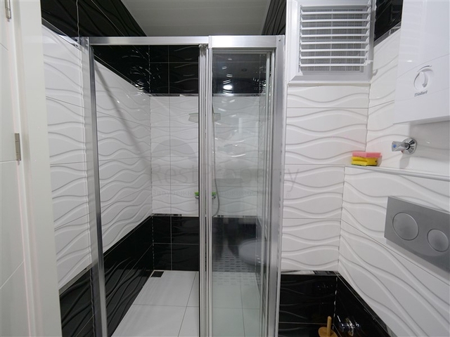 Уютная 1+1 с собственной терассой в районе Оба