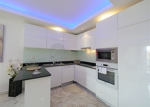 Уютная 1+1 с собственной терассой в районе Оба