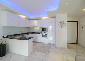 Уютная 1+1 с собственной терассой в районе Оба