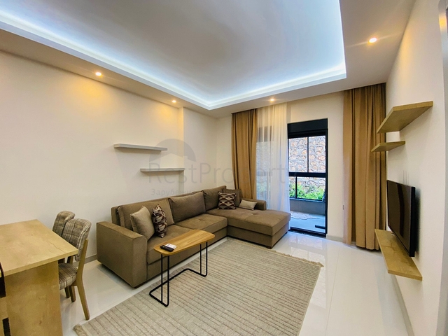 Уникальная квартира 1+1 с выходом в сад