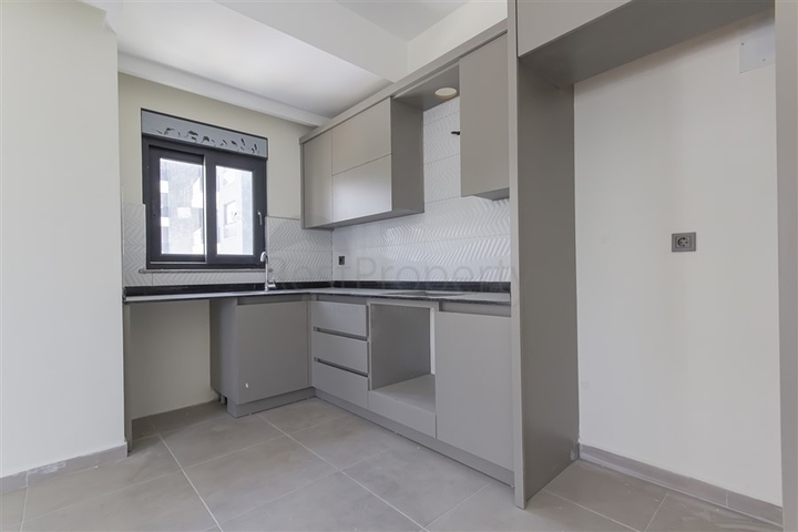 Квартира 1+1 в районе Махмутлар