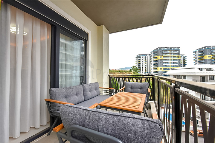 Квартира 1+1  в аренду в районе Махмутлар