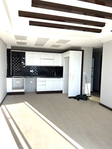 Двухкомнатная квартира в новом жилом комплексе в Махмутларе