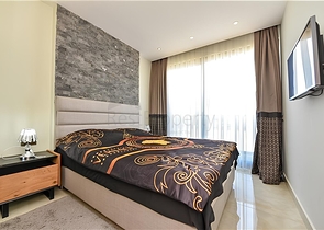 Квартира планировкой 2+1 на первой береговой линии в Махмутлар