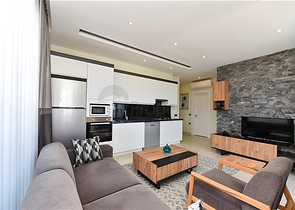 Квартира планировкой 2+1 на первой береговой линии в Махмутлар