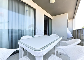 Квартира планировкой 2+1 на первой береговой линии в Махмутлар