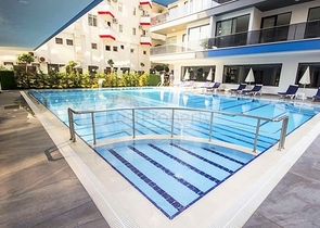 Квартира планировкой 2+1 на первой береговой линии в Махмутлар