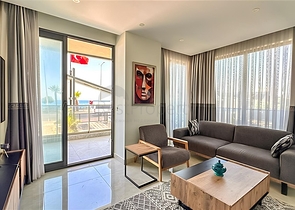 Квартира планировкой 2+1 на первой береговой линии в Махмутлар