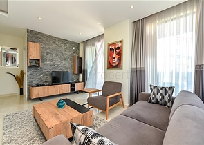 Квартира планировкой 2+1 на первой береговой линии в Махмутлар