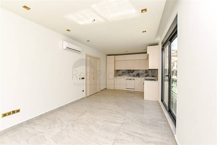 Квартира 2+1 в комплексе премиум класса в центре Алании 