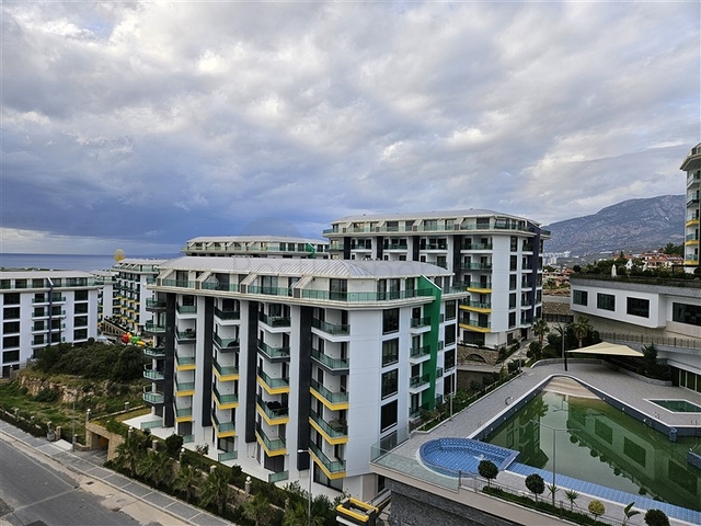 Квартира 1+1 в районе Каргыджак всего в 200 м от моря 