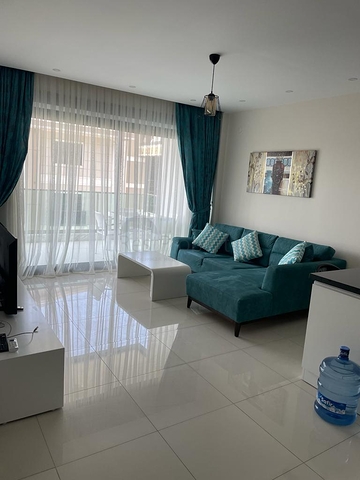 Квартира 1+1 в районе Каргыджак всего в 200 м от моря 