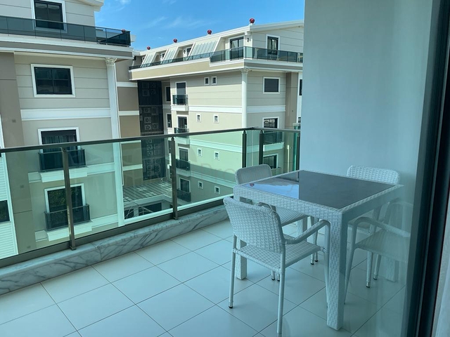 Квартира 1+1 в районе Каргыджак всего в 200 м от моря 