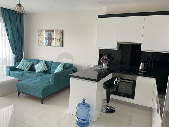 Квартира 1+1 в районе Каргыджак всего в 200 м от моря 