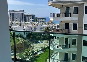 Квартира 1+1 в районе Каргыджак всего в 200 м от моря 