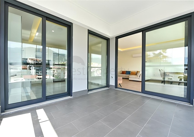 Квартира 2+1 с отдельной кухней в 50 метрах от моря в центре Алании