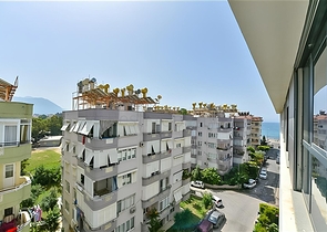 Квартира 2+1 с отдельной кухней в 50 метрах от моря в центре Алании