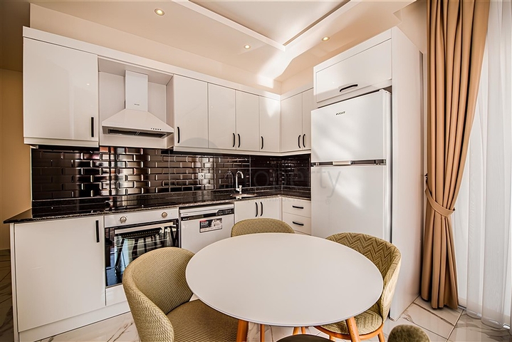 Двухкомнатная квартира в новом комплексе в центре Алании