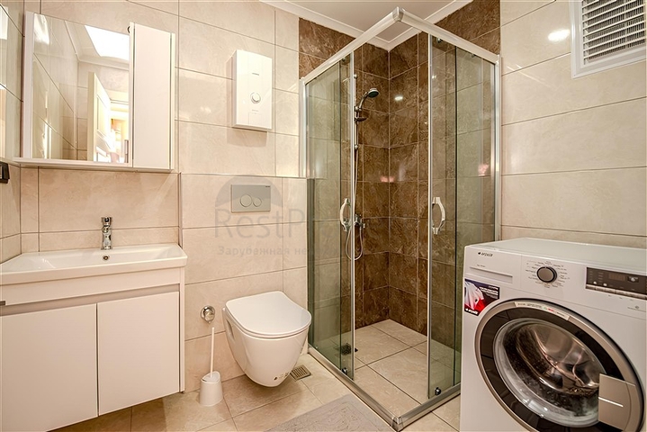 Двухкомнатная квартира в новом комплексе в центре Алании