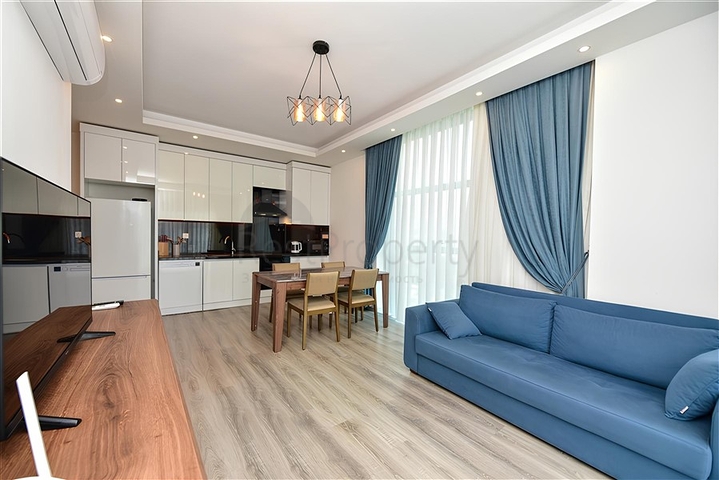 Квартира планировкой 1+1 в районе Махмутлар