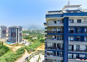 Квартира планировкой 1+1 в районе Махмутлар