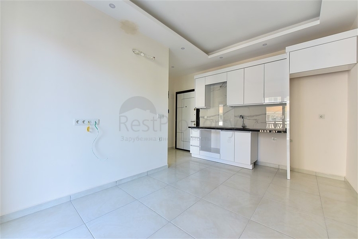 Квартира 1+1 в районе Махмутлар в 600 м от моря