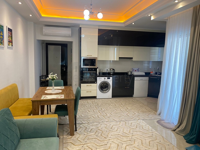 Двухкомнатная квартира в районе Махмутлар