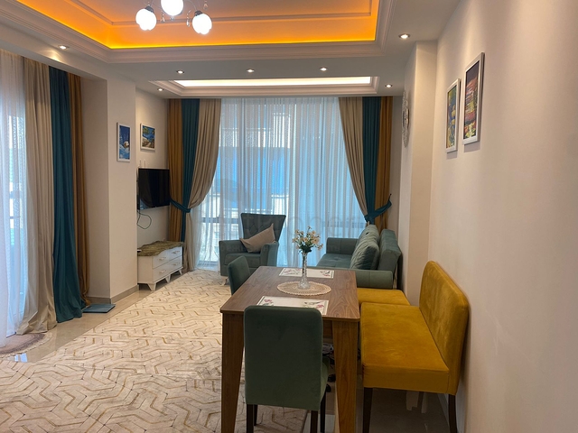 Двухкомнатная квартира в районе Махмутлар