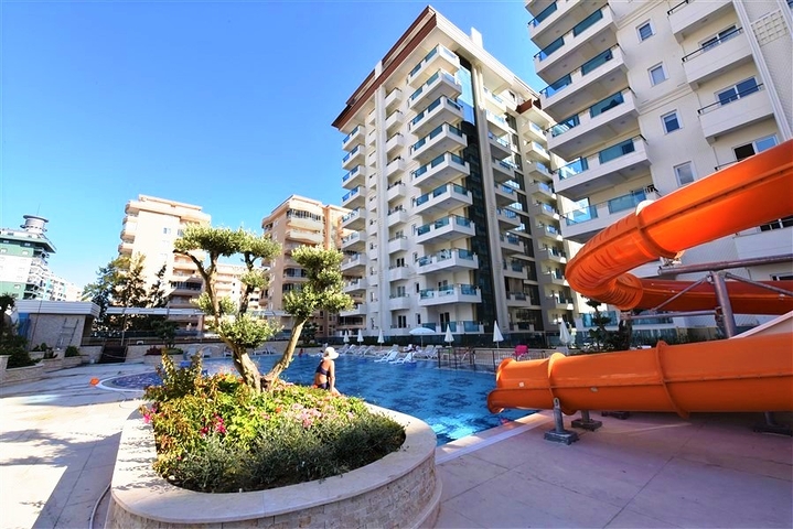 Двухкомнатная квартира в районе Махмутлар