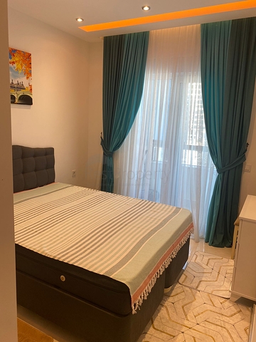 Двухкомнатная квартира в районе Махмутлар