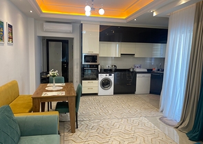 Двухкомнатная квартира в районе Махмутлар