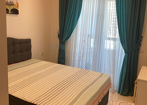 Двухкомнатная квартира в районе Махмутлар