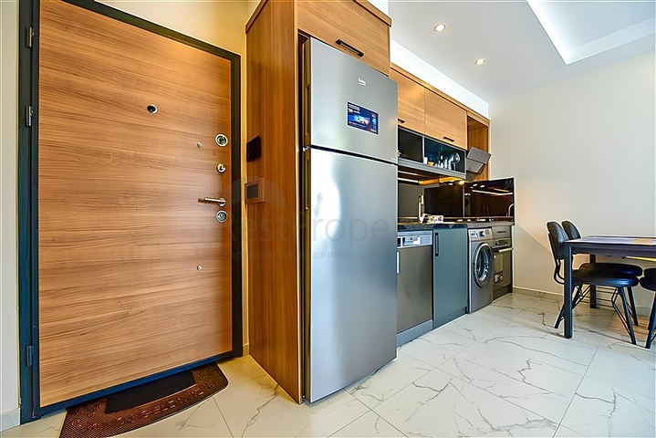 Квартира 1+1 в новом комплексе в районе Махмутлар