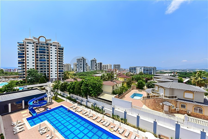 Квартира 1+1 в новом комплексе в районе Махмутлар