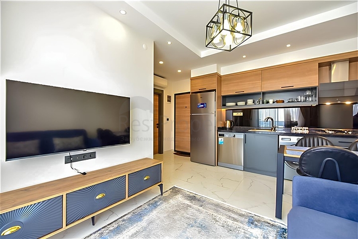 Квартира 1+1 в новом комплексе в районе Махмутлар