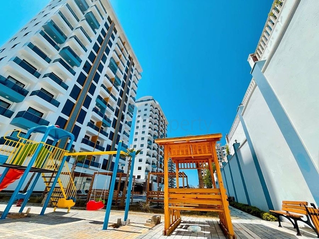 Квартира 1+1 в новом комплексе в районе Махмутлар