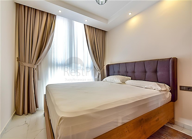 Квартира 1+1 в новом комплексе в районе Махмутлар