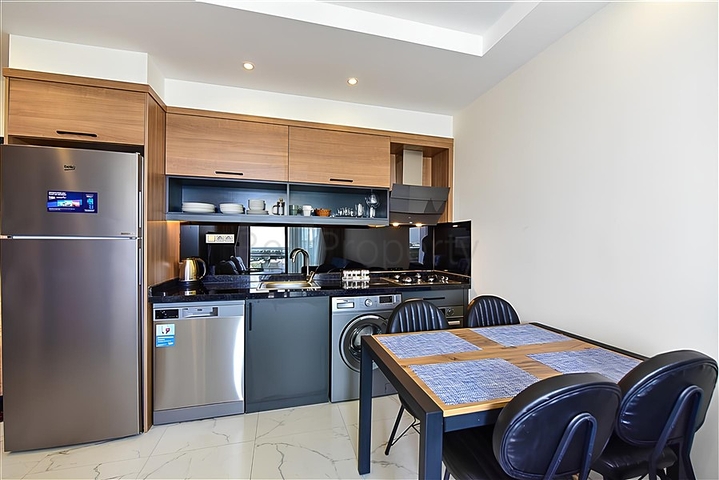 Квартира 1+1 в новом комплексе в районе Махмутлар