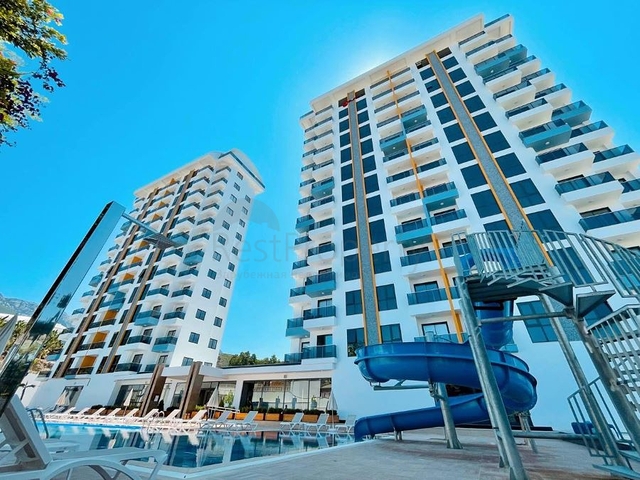 Квартира 1+1 в новом комплексе в районе Махмутлар