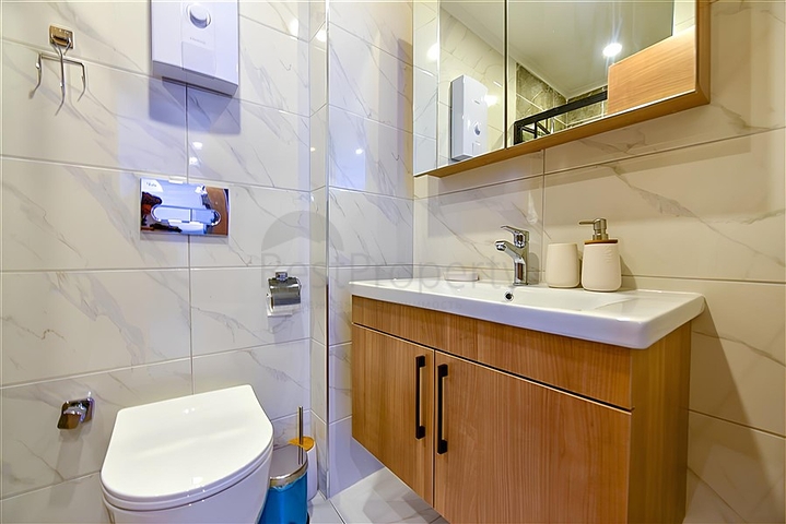 Квартира 1+1 в новом комплексе в районе Махмутлар