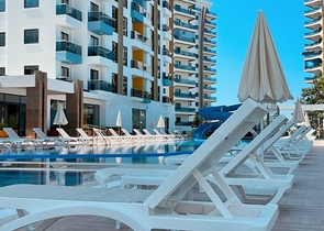 Квартира 1+1 в новом комплексе в районе Махмутлар