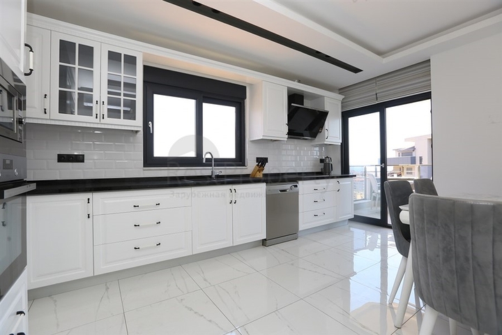 Квартира планировкой 3+1 с отдельной кухней в центральной части Алании